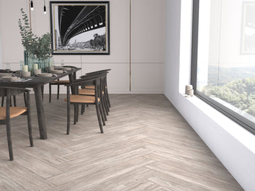 Carrelage sol/mur effet bois naturel Mat Chelsea Oliva dans une salle à manger élégante.