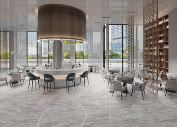 Luxurious interior with marble-effect floor tiles, Canyon Grigio by QUA, enhancing elegance and sophistication in a modern setting.